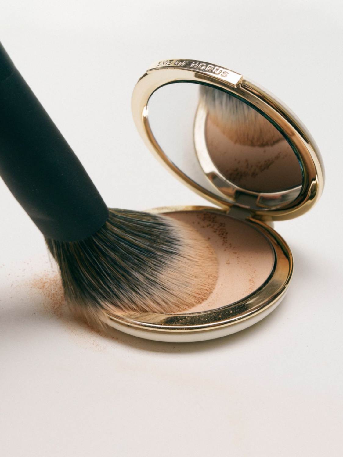 Pressed powder, natural finishing powder, makeup, Eye of Horus cosmetics, Nourished